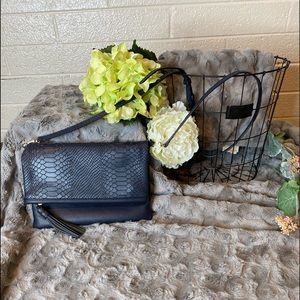 Gigi New York cross body and clutch style purse